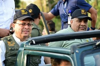 जिम कॉर्बेट पार्क से लाई बाघिन को सीएम धामी ने बाड़े से किया आजाद, मोतीचूर रेंज के जंगल में छोड़ा